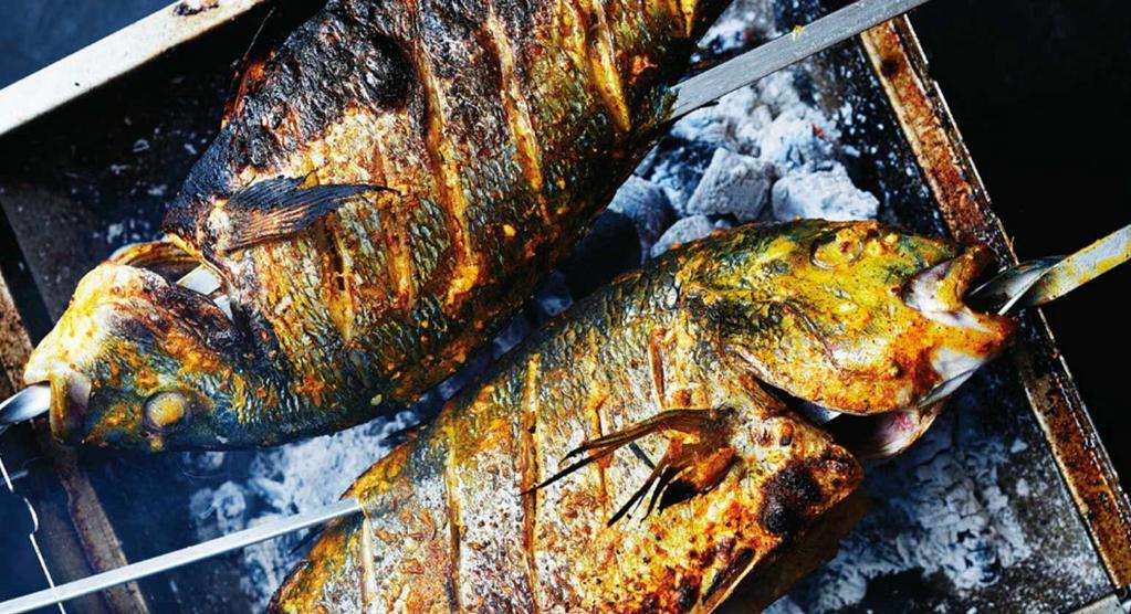 Tandoori Tilapia Whole Fish · Tilapia fish baked in a tandoori oven with a smoky taste