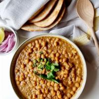 Chikkar Chole · Chickpeas cooked in herbs and spices.