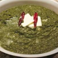 Sarson Ka Saag · Mustard greens cooked with ghee, herbs and spices.