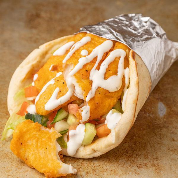 Fish Gyro Combo · Includes french fries and a free can soda. Gyro comes with Lettuce, Tomato, Onion & White Sauce.