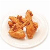6 Pc Chicken Wings Combo · Includes French fries & a free can soda.