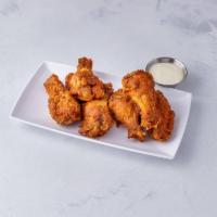 Buffalo Wings - 7 Pieces · 7 pieces. Breaded or battered crispy chicken.