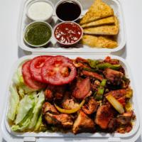 Chicken Platter · Served with chicken, rice, and  fresh lettuce. Along with your choice of toppings and sauce.
