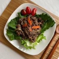 Beef Bulgogi · 24 oz. Soy sauce marinated beef & assorted vegetables and rice.