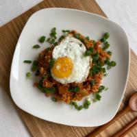 Kimchi Stir-Fried Rice with pork · 24 oz. Stir-fried kimchi & pork rice and fried egg.