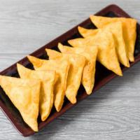 12. Krab Rangoon · Fried wonton wrapper filled with imitation crab and cream cheese.