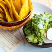Guacamole · Fresh molcajete guacamole and chips sold separately. Vegetarian.