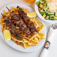 Pork Souvlaki Platter · All natural, marinated and cooked to perfection on char-broiler or rotisserie. Served with c...