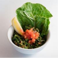 Tabbouleh · A salad made with finely chopped parsley mint, bulgur and onion seasoned with olive oil, lem...