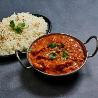 Butter Chicken · Chicken thigh meat boneless cooked with butter and curry sauce.