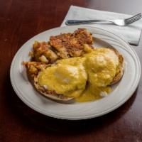Traditional Eggs Benedict · 2 poached eggs, Canadian bacon on an English muffin