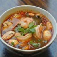 Tom Yum Soup · Feature a spicy, tart, highly aromatic broth, the broth is a lively blend of shrimp stock, l...