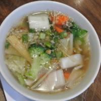 Glass Noodle Soup · Thai traditional clear broth soup with bean thread, fried garlic, ginger and mixed vegetables.