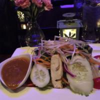 Thai Salad · Mixed greens, lettuce, cucumber, tomato, red onion, tofu carrot, and  bean sprouts with pean...