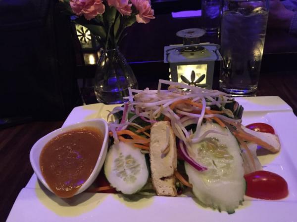 Thai Salad · Mixed greens, lettuce, cucumber, tomato, red onion, tofu carrot, and  bean sprouts with peanut dressing. Gluten free.