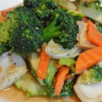 Healthy Delight · Sauteed mixed vegetables and tofu in brown sauce.