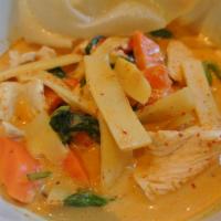 Red Curry · Red curry paste with bamboo shoot, eggplant, carrot, bell pepper, basil in coconut milk. Med...