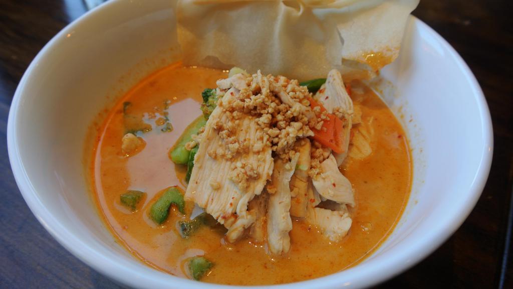 Peanut Curry · Peanut curry paste with ground peanut, broccoli, carrot and bell pepper in coconut milk. Medium Spicy.