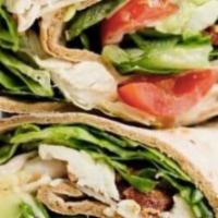 Chicken Caesar Wrap · Grilled chicken, Asiago cheese, Romaine lettuce, and Caesar dressing in your choice of wrap ...