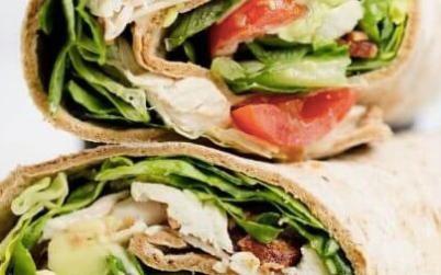 Chicken Caesar Wrap · Grilled chicken, Asiago cheese, Romaine lettuce, and Caesar dressing in your choice of wrap or bread.