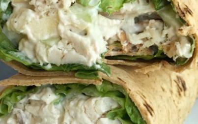 Chicken Salad Wrap · Chicken Salad (made with red onion, celery, pickles, mayonnaise and spices) paired with Romaine lettuce in your choice of wrap or bread.