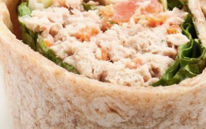Tuna Salad Wrap · Tuna salad (made with mayonnaise, red onion, celery, pickles and spices), Romaine lettuce and sliced tomatoes in your choice of wrap or bread.