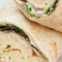 Turkey Wrap · Oven roasted turkey, red pepper hummus, fresh baby spinach and Romaine lettuce in your choic...