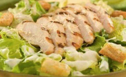 Caesar Salad with Grilled Chicken · All natural Grilled Chicken, Romaine lettuce, Asiago cheese, and housemade croutons, with a side of Caesar dressing.