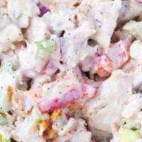 Chicken Salad on Mixed Green Salad · Chicken salad (made with chicken breast, mayonnaise, red grapes, celery, and walnuts) on a b...
