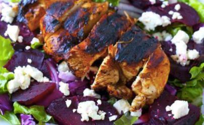 Light Mediterranean Salad with Beets · Marinated grilled chicken, marinated beets, field of greens, feta cheese, tomato, cucumber, pickled red onion, black olives, and almonds on the side..