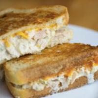 Tuna Salad Melt · Tuna salad (made with mayonnaise, red onions, celery and spices) and Cheddar cheese melted y...