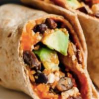 Tofu Burrito · Marinated Tofu filled with black beans, rice, shredded cheese, and on the side: sour cream, ...