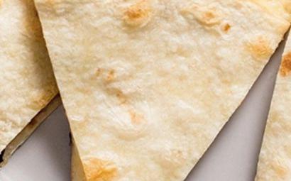 Cheese Quesadilla · Cheddar & Monterey Jack cheese, on a flour tortillas with house salsa and sour cream on the side.