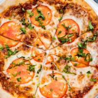 Margherita Pizza · Fresh mozzarella, san marzano tomato sauce, sliced tomatoes and basil.