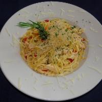 Chicken Fettuccine · Dried chicken and artichoke hearts in a rich cream sauce, with lots of Romano, Parmesan and ...