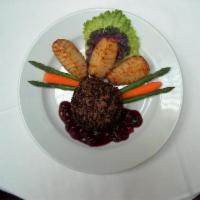Peppercorn Filet · Contains raw egg. Gluten free. Pan seared peppercorn crusted filet, served with sun dried ch...