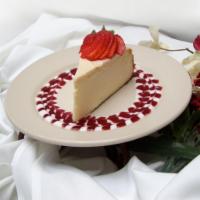 Capistrano's Cheesecake · Rich homemade cheesecake in a graham cracker crust topped with strawberry sauce.