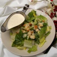 Dinner Caesar Salad · Contains raw eggs. Caesar salad with Parmesan cheese, garlic and croutons tossed with tradit...