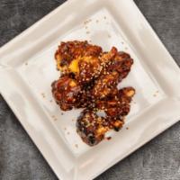 BBQ Cauliflower Power  · Korean style BBQ cauliflower covered in seasame seeds & crushed cocktail peanuts
