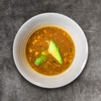 Enjoy the Lentil Things  · Colombian style lentil soup with added sweet potato, avocado chunks, and garden veggies.