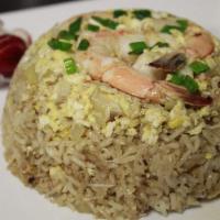Fried Rice · Wok-fried jasmine rice with onions and tomatoes, topped with spring onions.