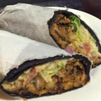 Black Bean Wrap · Black Bean Burger topped with hummus, romaine lettuce, red onions and tomatoes wrapped in a ...