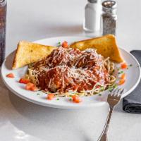 Spaghetti and  Meatballs · A hearty serving of spaghetti in homemade marinara sauce with 2 large Italian meatballs, top...