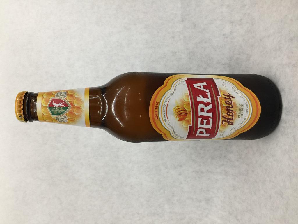 8. Perla Beer Bottle 16.9 oz. · Must be 21 to purchase. Chmielowa, honey, export.