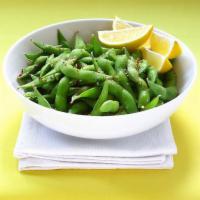 Edamame · Steamed soybeans, lightly salted with lemon wedge.
