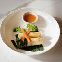Po Pia Tod · Crispy roll stuffed with carrot, cabbage and taro folded in vermicelli served with plum vina...