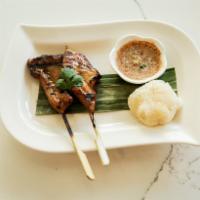 Grilled Pork Skewer · Thai style pork marinated and grilled to perfection.