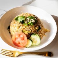 Tom Yum Fried Rice Bowl · Lemongrass, kaffir lime leaf, onion, scallion and egg.