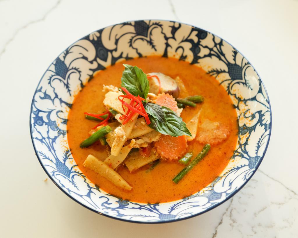 Red Curry · Bell pepper, Thai eggplant, bamboo shoot, string beans, carrot and basil leaf in red curry sauce.