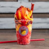 Mango Strawberry Fusion · Mango and strawberry Italian ice topped with chamoy, chili powder, relitos, fresh fruit, and...